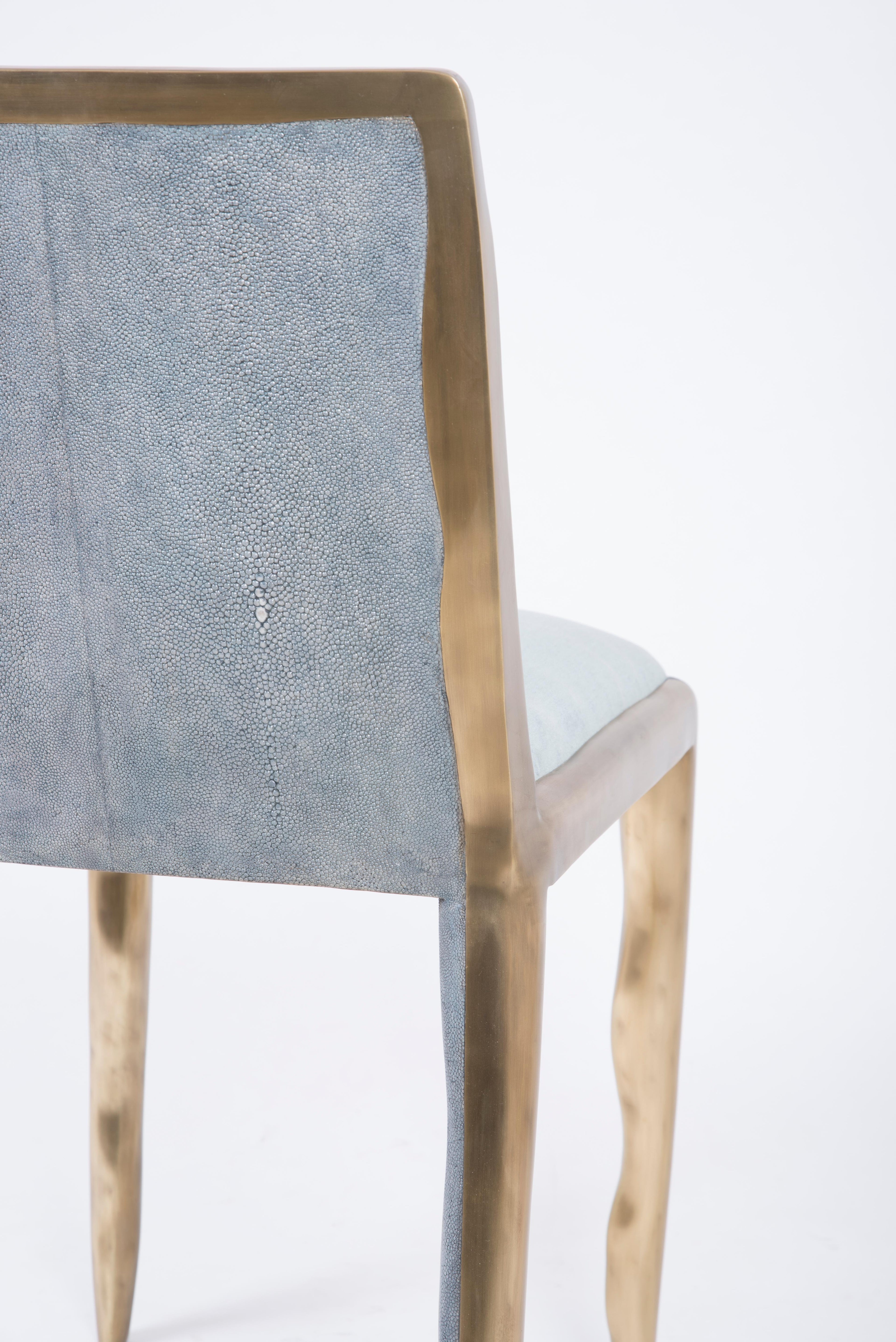 https://a.1stdibscdn.com/melting-chair-in-blue-shagreen-and-bronze-patina-brass-by-ry-augousti-for-sale-picture-5/f_45491/f_163723221570374691803/DSC_6620_master.jpg
