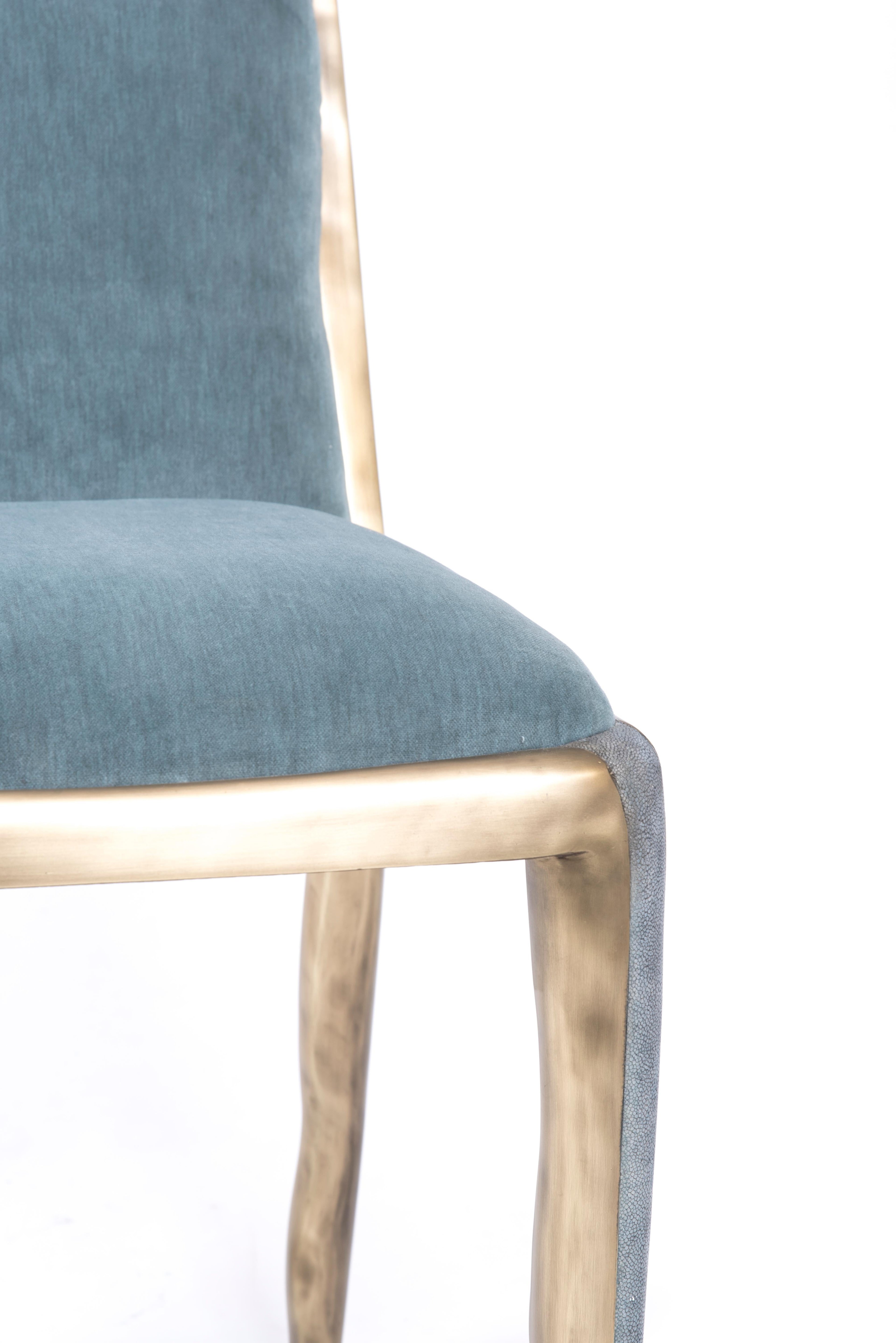 https://a.1stdibscdn.com/melting-chair-in-blue-shagreen-and-bronze-patina-brass-by-ry-augousti-for-sale-picture-6/f_45491/f_163723221570374702857/DSC_6622_master.jpg