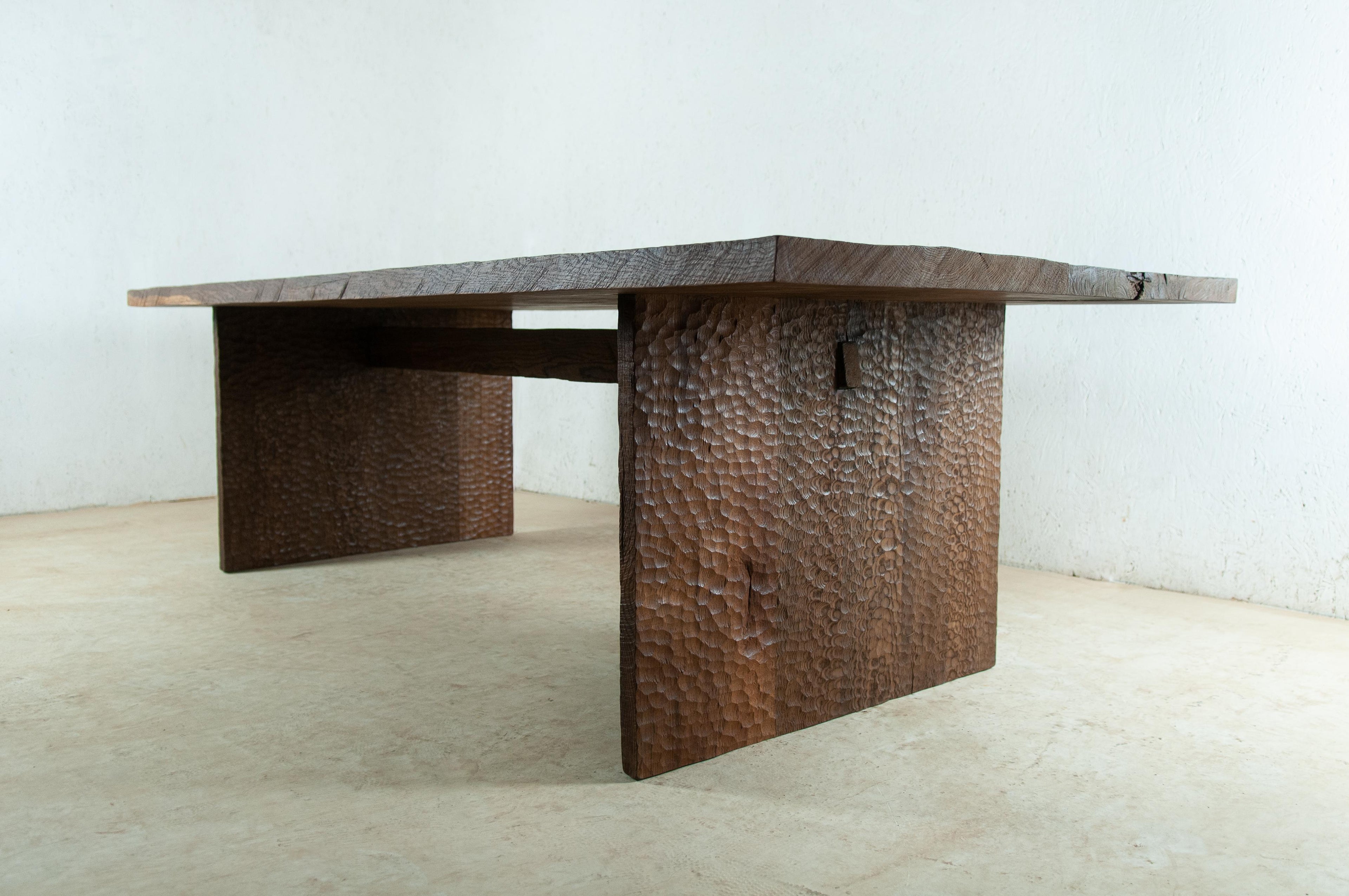 https://a.1stdibscdn.com/sculpted-dining-table-hammered-in-solid-oakwood-custom-size-s-for-sale-picture-2/f_31233/f_255971321633440218421/DSC_6694_master.jpg