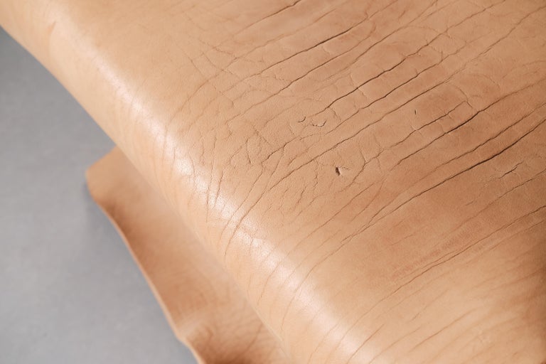 https://a.1stdibscdn.com/contemporary-brown-water-buffalo-leather-chairs-atribut-by-jordi-ribaudi-for-sale-picture-11/f_69342/f_488820621771453702388/_DSF1307_master.jpg?width=768