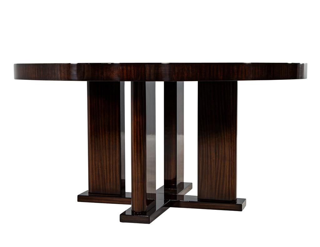 https://a.1stdibscdn.com/custom-modern-round-macassar-dining-table-for-sale-picture-10/f_8849/f_395972021715026779573/DS_4976_Custom_Modern_Round_Macassar_Dining_Table_0010_master.jpg