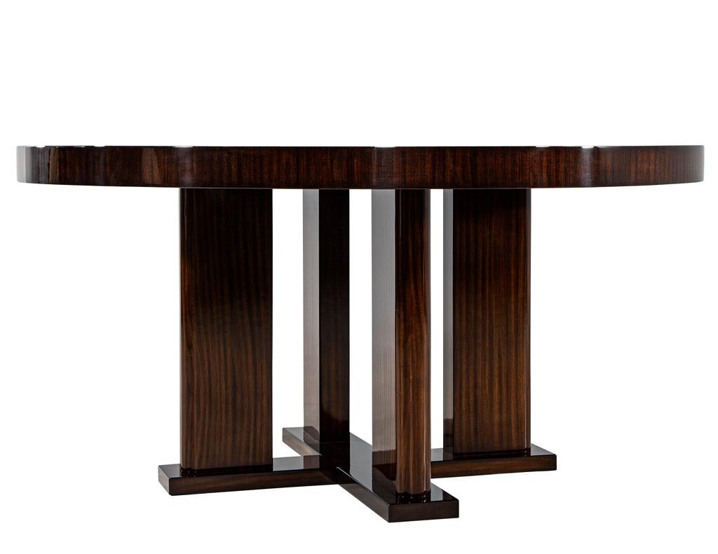 https://a.1stdibscdn.com/custom-modern-round-macassar-dining-table-for-sale-picture-11/f_8849/f_395972021715026779572/DS_4976_Custom_Modern_Round_Macassar_Dining_Table_0011_master.jpg