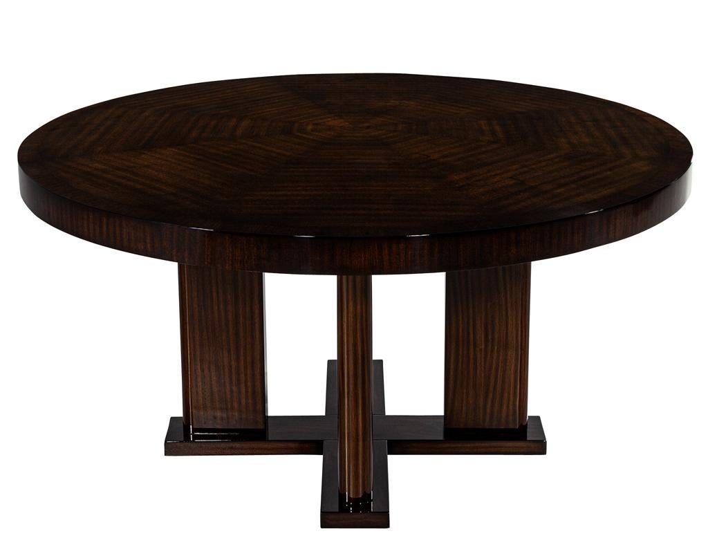 https://a.1stdibscdn.com/custom-modern-round-macassar-dining-table-for-sale-picture-2/f_8849/f_395972021715026778717/DS_4976_Custom_Modern_Round_Macassar_Dining_Table_002_master.jpg