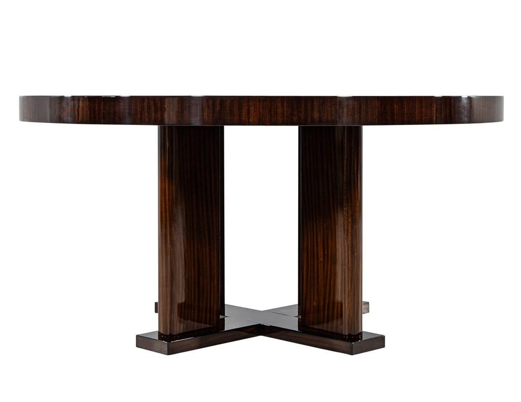 https://a.1stdibscdn.com/custom-modern-round-macassar-dining-table-for-sale-picture-4/f_8849/f_395972021715026778690/DS_4976_Custom_Modern_Round_Macassar_Dining_Table_004_master.jpg