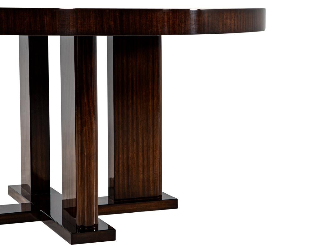 https://a.1stdibscdn.com/custom-modern-round-macassar-dining-table-for-sale-picture-5/f_8849/f_395972021715026778755/DS_4976_Custom_Modern_Round_Macassar_Dining_Table_005_master.jpg