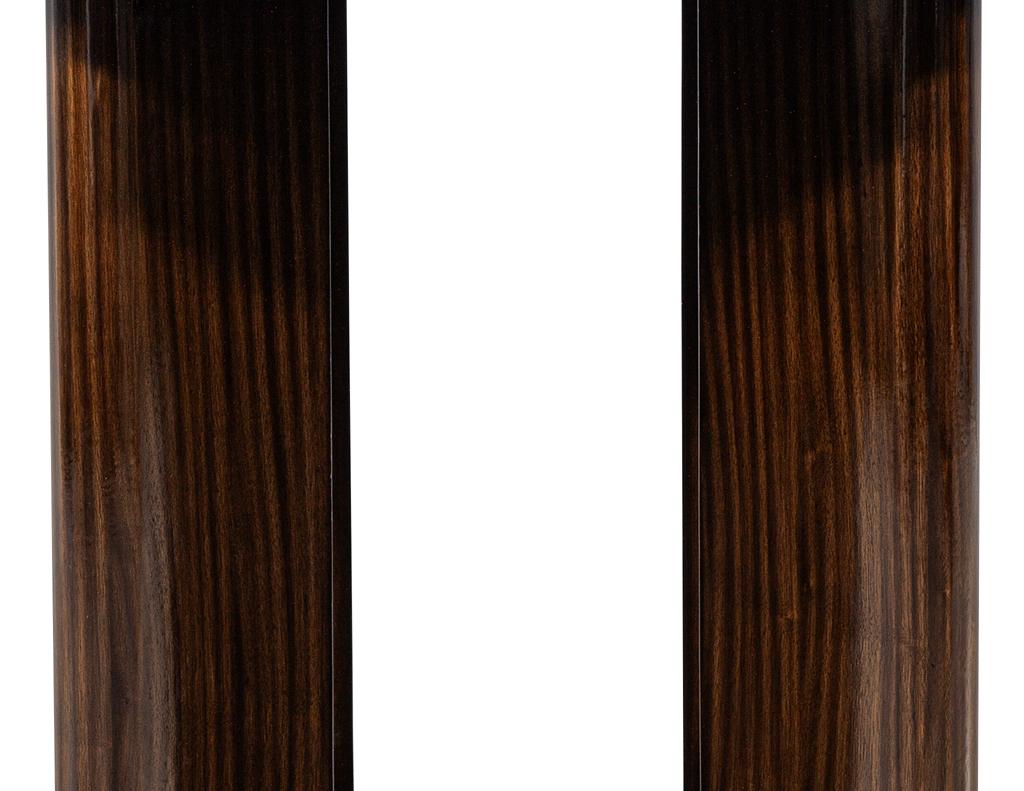 https://a.1stdibscdn.com/custom-modern-round-macassar-dining-table-for-sale-picture-6/f_8849/f_395972021715026778923/DS_4976_Custom_Modern_Round_Macassar_Dining_Table_006_master.jpg