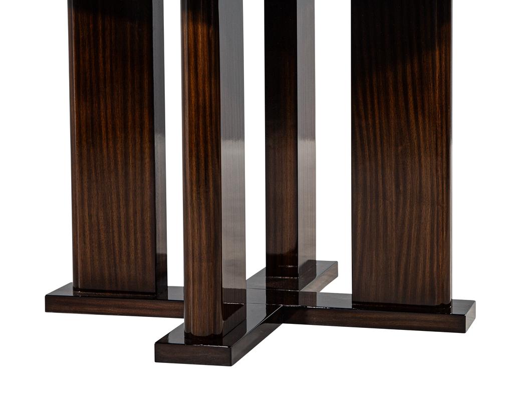 https://a.1stdibscdn.com/custom-modern-round-macassar-dining-table-for-sale-picture-7/f_8849/f_395972021715026778908/DS_4976_Custom_Modern_Round_Macassar_Dining_Table_007_master.jpg