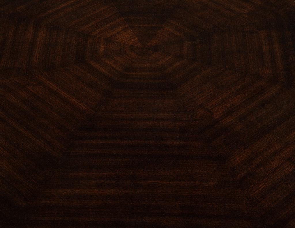 https://a.1stdibscdn.com/custom-modern-round-macassar-dining-table-for-sale-picture-9/f_8849/f_395972021715026779594/DS_4976_Custom_Modern_Round_Macassar_Dining_Table_009_master.jpg