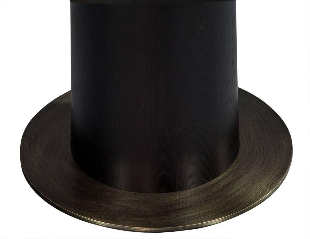 https://a.1stdibscdn.com/round-modern-solid-oak-dining-table-with-brass-accents-for-sale-picture-6/f_8849/f_253422221631803437464/DS_5082_006_master.jpg