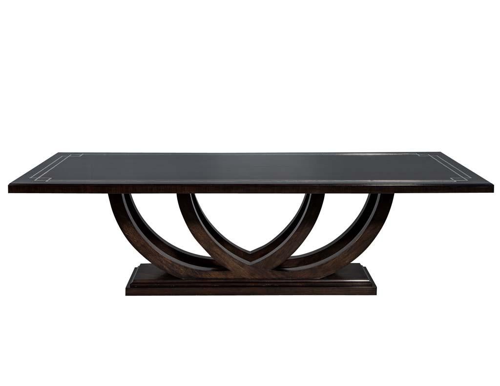 https://a.1stdibscdn.com/custom-walnut-dining-table-with-polished-metal-inlay-details-and-curved-base-for-sale-picture-3/f_8849/1553116287870/DS_5097_003_master.jpg