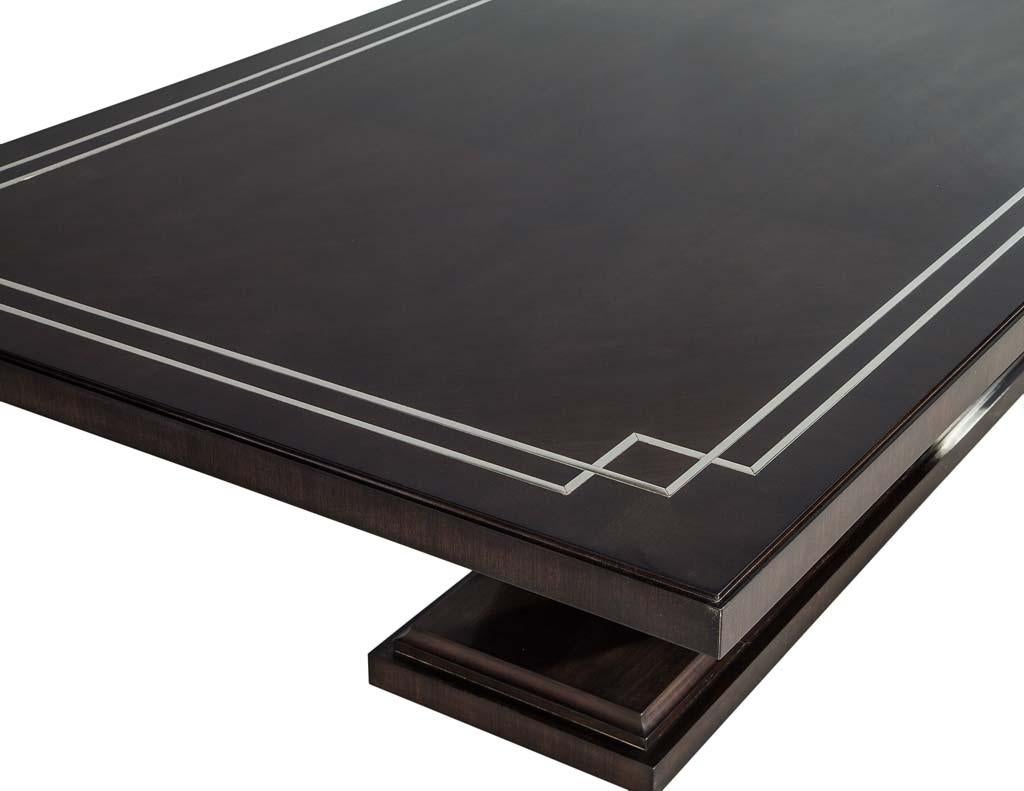 https://a.1stdibscdn.com/custom-walnut-dining-table-with-polished-metal-inlay-details-and-curved-base-for-sale-picture-6/f_8849/1553116287977/DS_5097_006_master.jpg