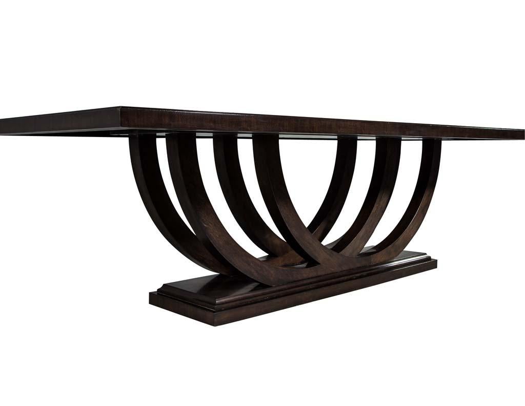 https://a.1stdibscdn.com/custom-walnut-dining-table-with-polished-metal-inlay-details-and-curved-base-for-sale-picture-8/f_8849/1553116288236/DS_5097_008_master.jpg