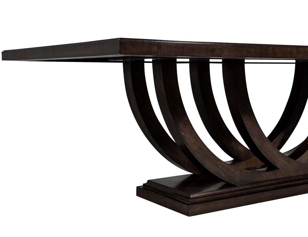 https://a.1stdibscdn.com/custom-walnut-dining-table-with-polished-metal-inlay-details-and-curved-base-for-sale-picture-9/f_8849/1553116288547/DS_5097_009_master.jpg