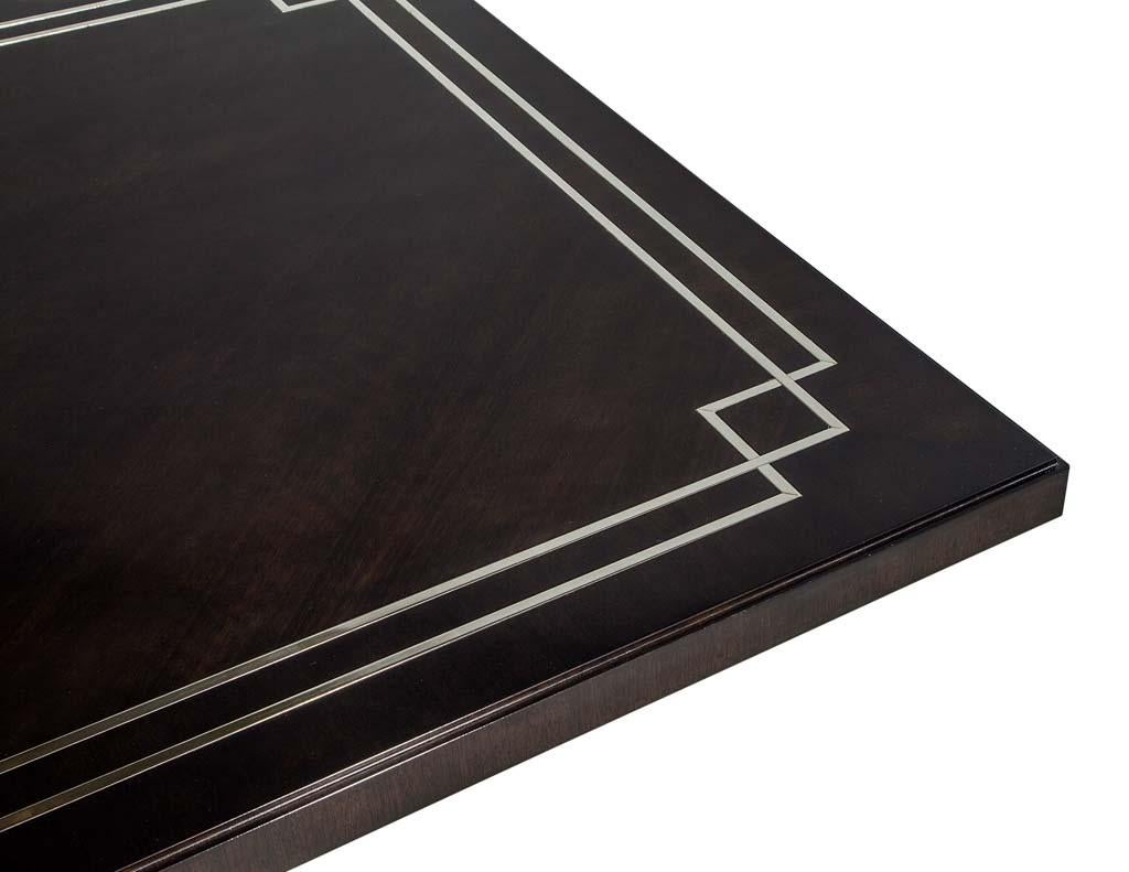 https://a.1stdibscdn.com/custom-walnut-dining-table-with-polished-metal-inlay-details-and-curved-base-for-sale-picture-11/f_8849/1553116289132/DS_5097_011_master.jpg
