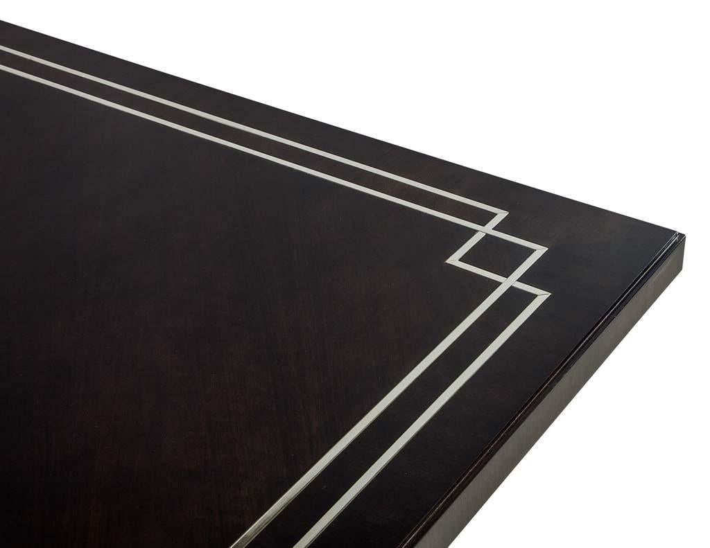 https://a.1stdibscdn.com/custom-walnut-dining-table-with-polished-metal-inlay-details-and-curved-base-for-sale-picture-12/f_8849/1553116289658/DS_5097_012_master.jpg