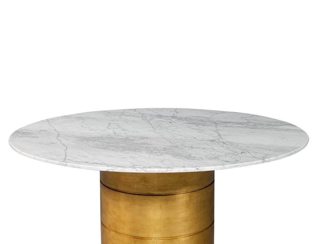 https://a.1stdibscdn.com/custom-round-marble-top-dining-table-with-gold-leafed-bezel-base-for-sale-picture-2/f_8849/1548526981591/DS_5101_002_master.jpg