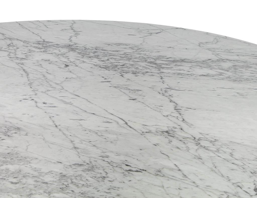 https://a.1stdibscdn.com/custom-round-marble-top-dining-table-with-gold-leafed-bezel-base-for-sale-picture-3/f_8849/1548526981985/DS_5101_003_master.jpg