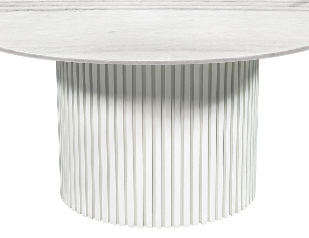 https://a.1stdibscdn.com/modern-round-white-marble-top-dining-table-for-sale-picture-6/f_8849/f_385326521708632409024/DS_5111_Custom_Round_Marble_Dining_Table_004_master.jpg