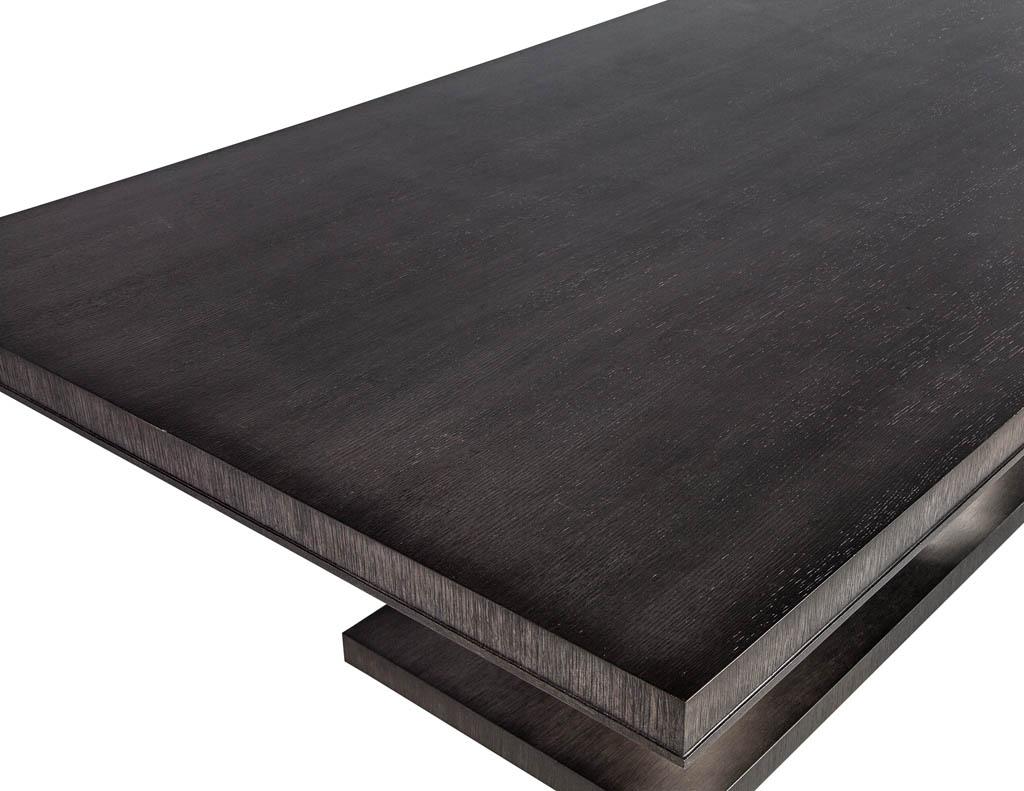 https://a.1stdibscdn.com/modern-oak-dining-table-with-double-column-champagne-ring-base-for-sale-picture-3/f_8849/1593197721604/DS_5123_Modern_Oak_Double_Pedestal_Brass_Ring_Dining_Table_003_master.jpg