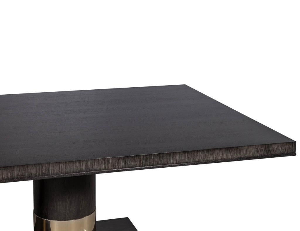 https://a.1stdibscdn.com/modern-oak-dining-table-with-double-column-champagne-ring-base-for-sale-picture-4/f_8849/1593197722031/DS_5123_Modern_Oak_Double_Pedestal_Brass_Ring_Dining_Table_004_master.jpg