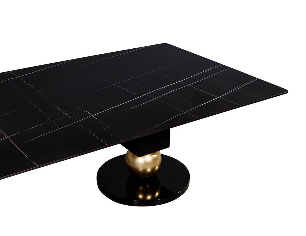 https://a.1stdibscdn.com/custom-modern-porcelain-black-dining-table-with-geometric-pedestals-for-sale-picture-9/f_8849/1611279737574/DS_5135_Custom_Modern_Porcelain_Black_Dining_Table_with_Gold_Leaf_Pedestals_0010_master.jpg