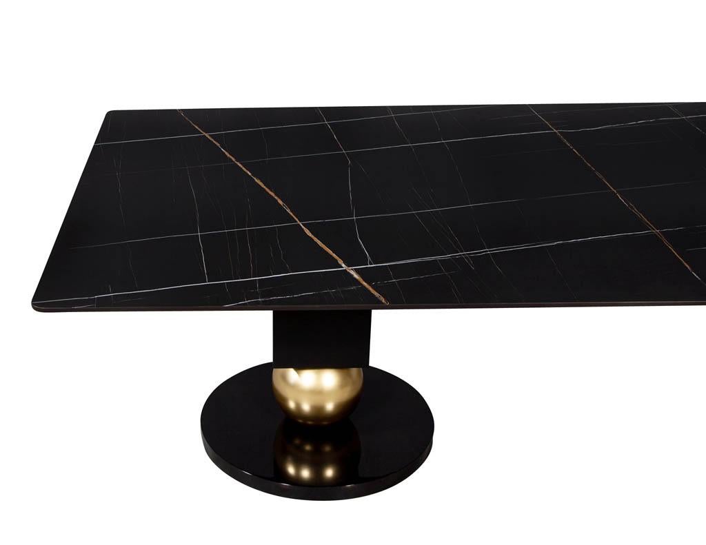 https://a.1stdibscdn.com/custom-modern-porcelain-black-dining-table-with-geometric-pedestals-for-sale-picture-10/f_8849/1611279737618/DS_5135_Custom_Modern_Porcelain_Black_Dining_Table_with_Gold_Leaf_Pedestals_0011_master.jpg