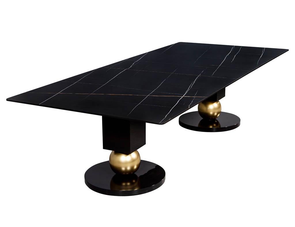 https://a.1stdibscdn.com/custom-modern-porcelain-black-dining-table-with-geometric-pedestals-for-sale-picture-3/f_8849/1611279737039/DS_5135_Custom_Modern_Porcelain_Black_Dining_Table_with_Gold_Leaf_Pedestals_003_master.jpg