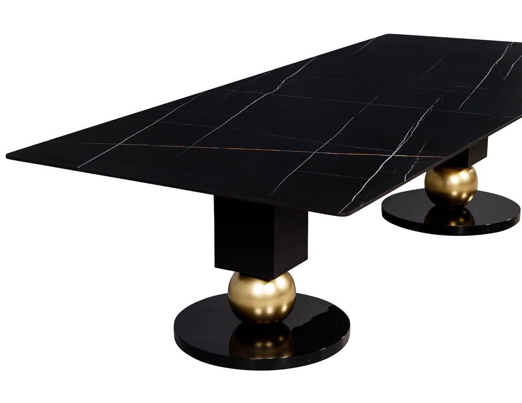 https://a.1stdibscdn.com/custom-modern-porcelain-black-dining-table-with-geometric-pedestals-for-sale-picture-4/f_8849/1611279737348/DS_5135_Custom_Modern_Porcelain_Black_Dining_Table_with_Gold_Leaf_Pedestals_004_master.jpg