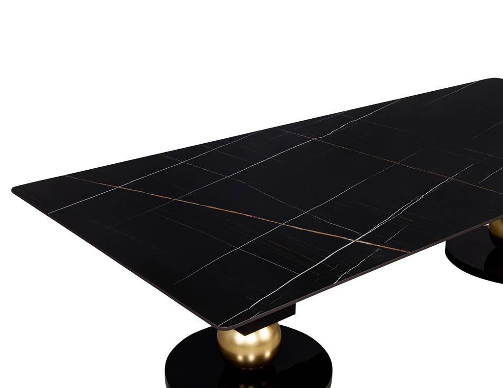 https://a.1stdibscdn.com/custom-modern-porcelain-black-dining-table-with-geometric-pedestals-for-sale-picture-5/f_8849/1611279737405/DS_5135_Custom_Modern_Porcelain_Black_Dining_Table_with_Gold_Leaf_Pedestals_005_master.jpg