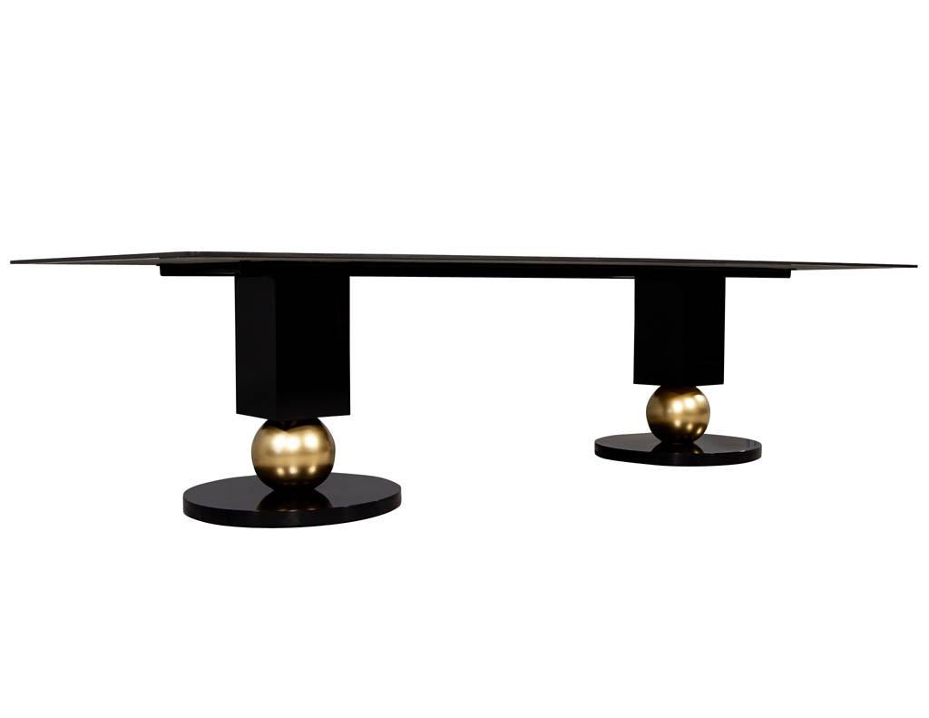 https://a.1stdibscdn.com/custom-modern-porcelain-black-dining-table-with-geometric-pedestals-for-sale-picture-6/f_8849/1611279737000/DS_5135_Custom_Modern_Porcelain_Black_Dining_Table_with_Gold_Leaf_Pedestals_007_master.jpg