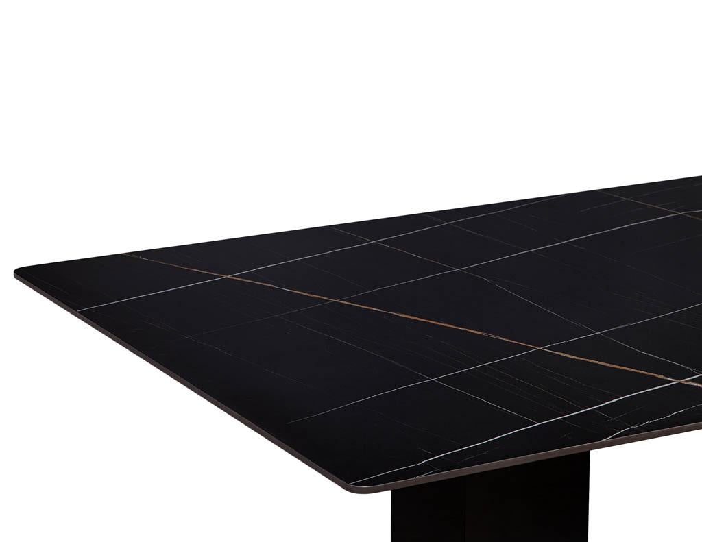 https://a.1stdibscdn.com/custom-modern-porcelain-black-dining-table-with-geometric-pedestals-for-sale-picture-7/f_8849/1611279737422/DS_5135_Custom_Modern_Porcelain_Black_Dining_Table_with_Gold_Leaf_Pedestals_008_master.jpg
