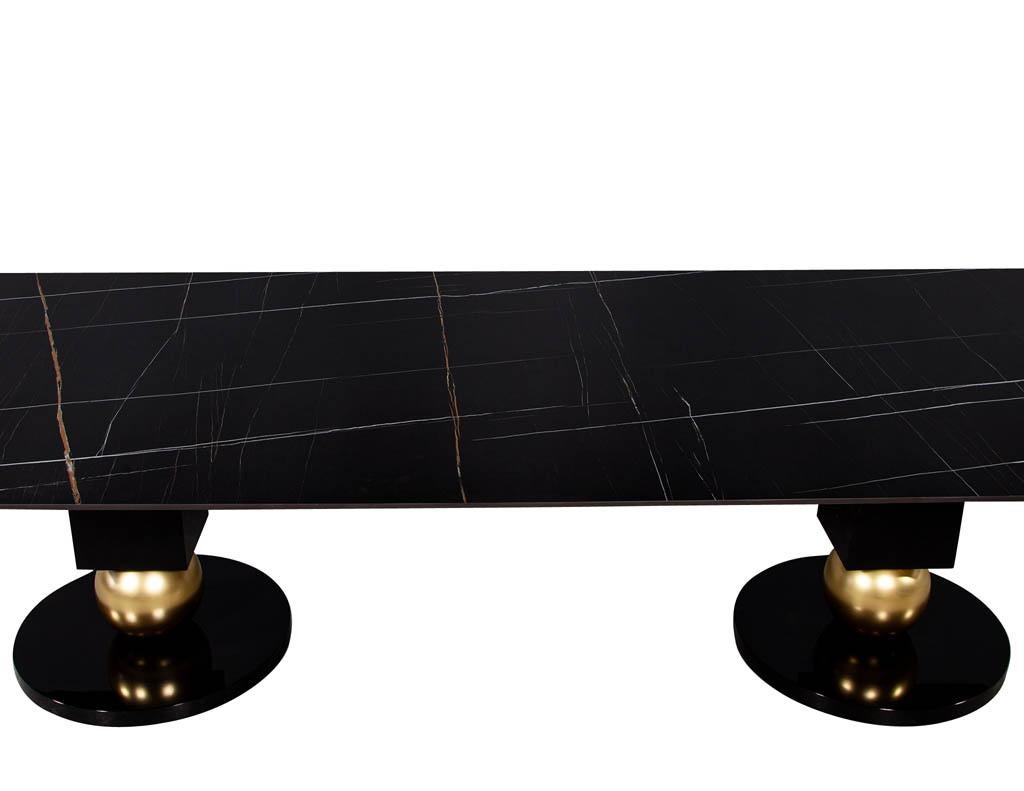 https://a.1stdibscdn.com/custom-modern-porcelain-black-dining-table-with-geometric-pedestals-for-sale-picture-8/f_8849/1611279737470/DS_5135_Custom_Modern_Porcelain_Black_Dining_Table_with_Gold_Leaf_Pedestals_009_master.jpg