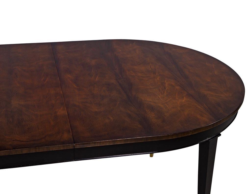 https://a.1stdibscdn.com/flamed-mahogany-dining-table-hepplewhite-inspired-for-sale-picture-4/f_8849/f_370162521699568220297/DS_5143_Mahogany_Oval_Dining_Table_004_master.jpg