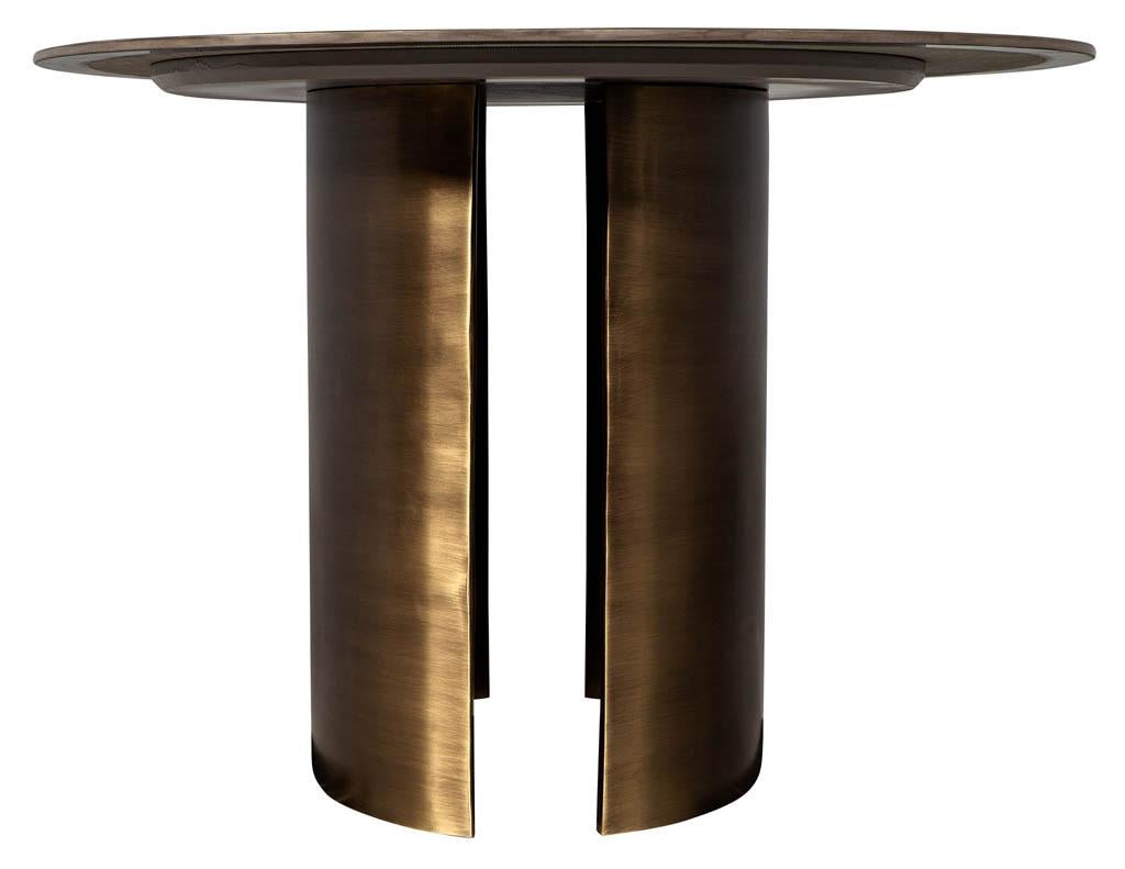 https://a.1stdibscdn.com/custom-oval-porcelain-top-dining-table-with-brass-demi-lune-base-by-carrocel-for-sale-picture-10/f_8849/1619713214645/DS_5157_Custom_Modern_Oval_Porcelain_Dining_Table_Brass_Base_0010_master.jpg