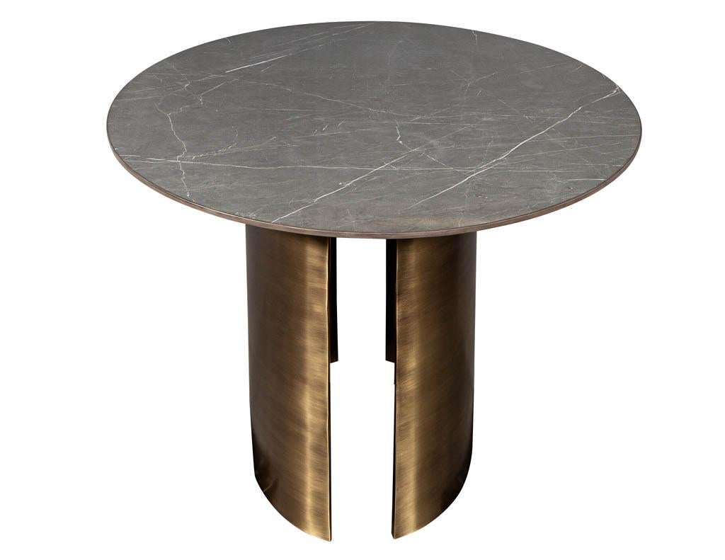https://a.1stdibscdn.com/custom-oval-porcelain-top-dining-table-with-brass-demi-lune-base-by-carrocel-for-sale-picture-5/f_8849/1619713211038/DS_5157_Custom_Modern_Oval_Porcelain_Dining_Table_Brass_Base_005_master.jpg