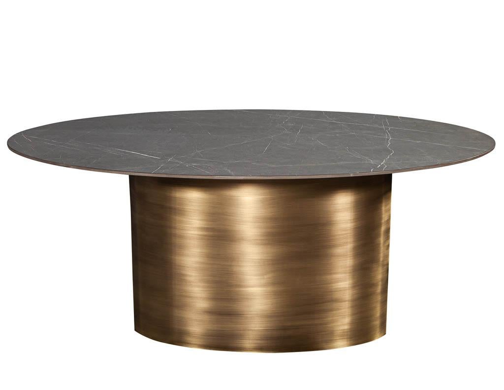 https://a.1stdibscdn.com/custom-oval-porcelain-top-dining-table-with-brass-demi-lune-base-by-carrocel-for-sale-picture-7/f_8849/1619713213672/DS_5157_Custom_Modern_Oval_Porcelain_Dining_Table_Brass_Base_007_master.jpg