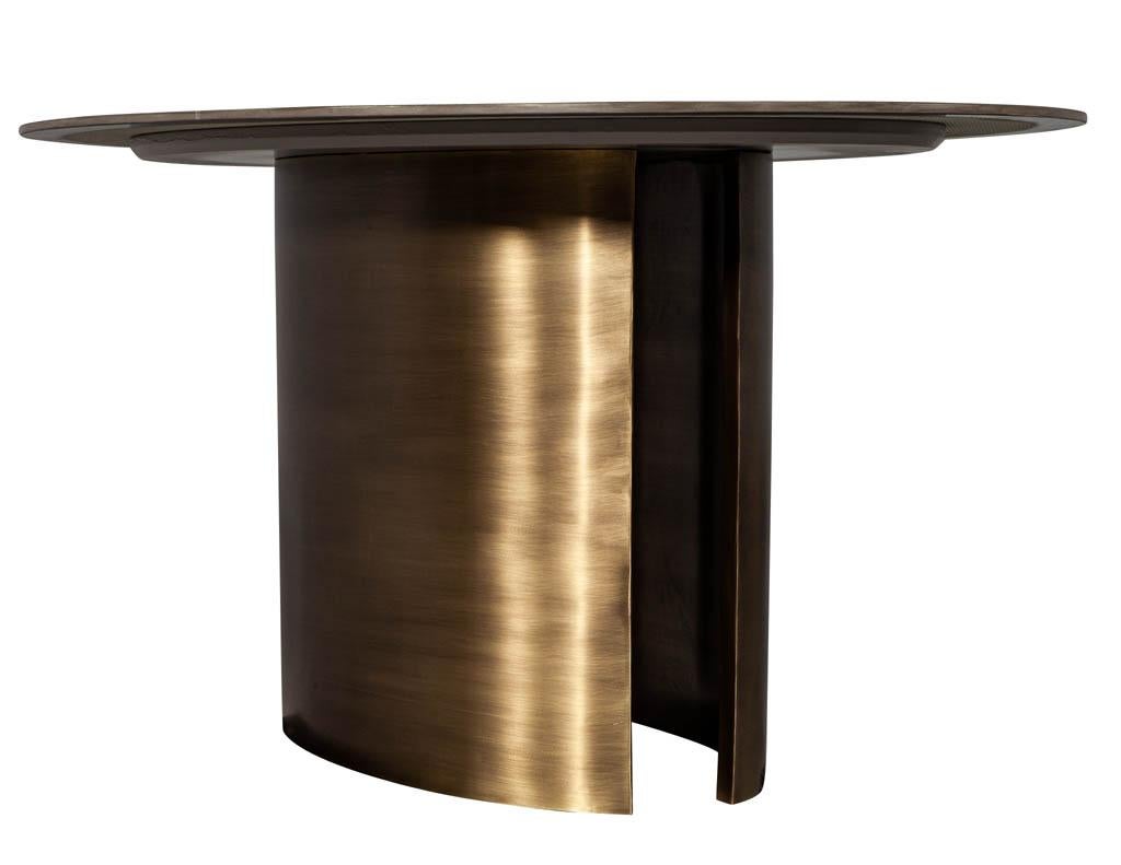 https://a.1stdibscdn.com/custom-oval-porcelain-top-dining-table-with-brass-demi-lune-base-by-carrocel-for-sale-picture-9/f_8849/1619713213157/DS_5157_Custom_Modern_Oval_Porcelain_Dining_Table_Brass_Base_009_master.jpg
