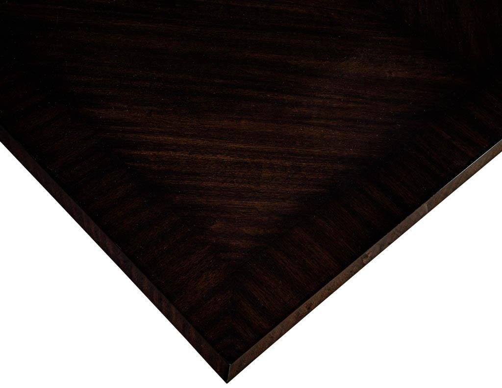 https://a.1stdibscdn.com/custom-macassar-dining-table-with-brass-bases-by-carrocel-for-sale-picture-4/f_8849/1619731679049/DS_5158_Custom_Modern_Dining_Table_Bass_Pedestals_Carrocel_003_master.jpg