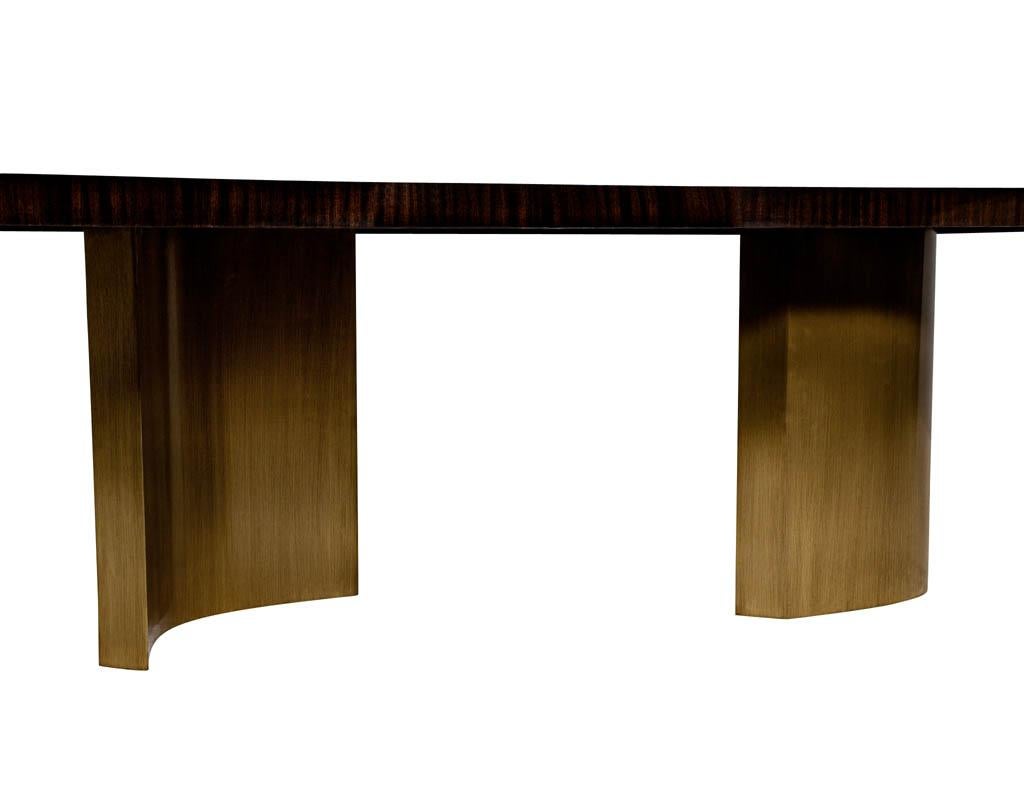 https://a.1stdibscdn.com/custom-macassar-dining-table-with-brass-bases-by-carrocel-for-sale-picture-8/f_8849/1619731679362/DS_5158_Custom_Modern_Dining_Table_Bass_Pedestals_Carrocel_007_master.jpg