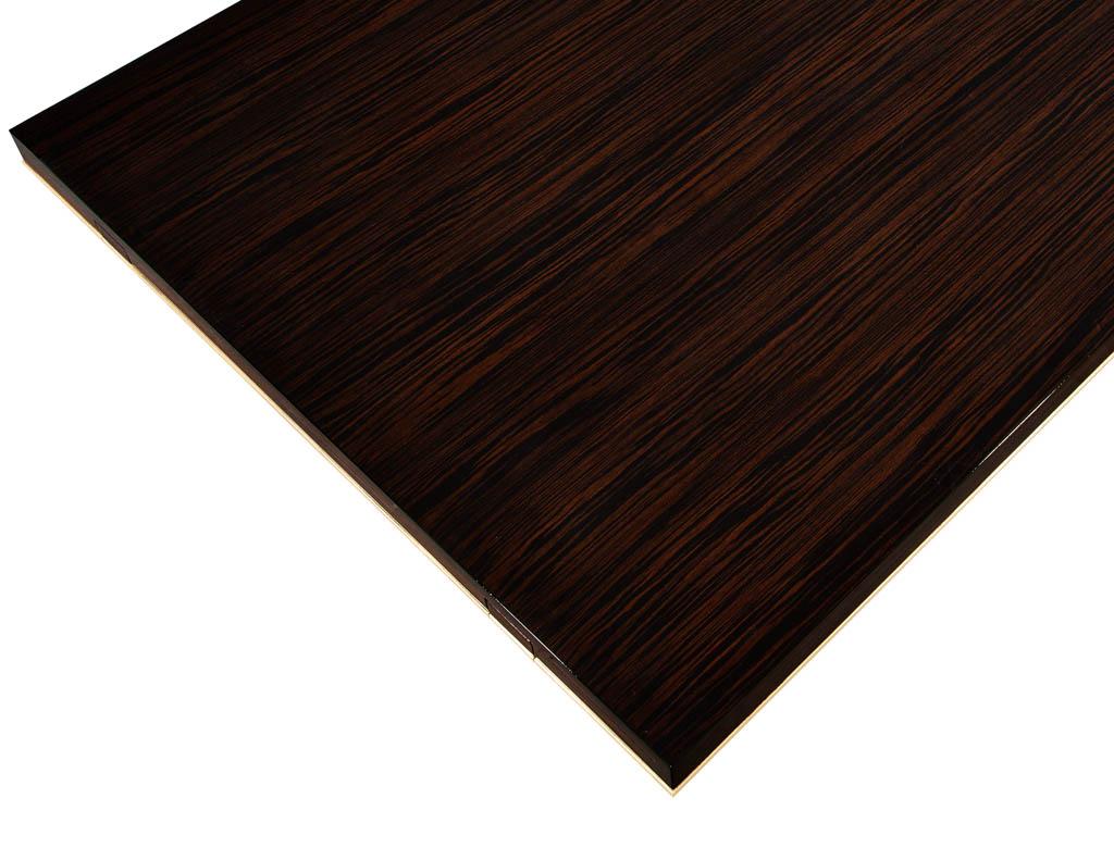 https://a.1stdibscdn.com/custom-art-deco-inspired-macassar-dining-table-gold-leaf-for-sale-picture-16/f_8849/f_249834521629472509440/DS_5170_Custom_Macassar_Dining_Table_Art_Deco_Inspired_0017_master.jpg