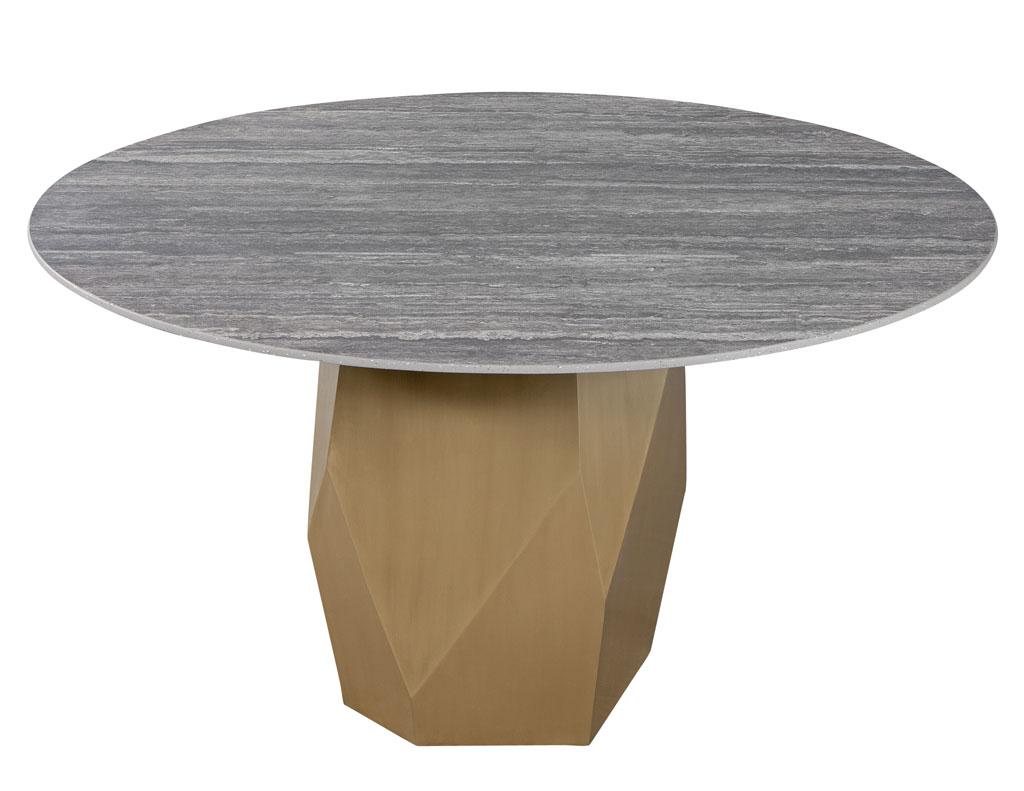 https://a.1stdibscdn.com/custom-modern-round-porcelain-dining-table-with-geometric-brass-base-for-sale-picture-2/f_8849/f_288134121653495405228/DS_5188_Carrocel_Custom_Stone_Top_Round_Modern_Dining_Table_001_master.jpg