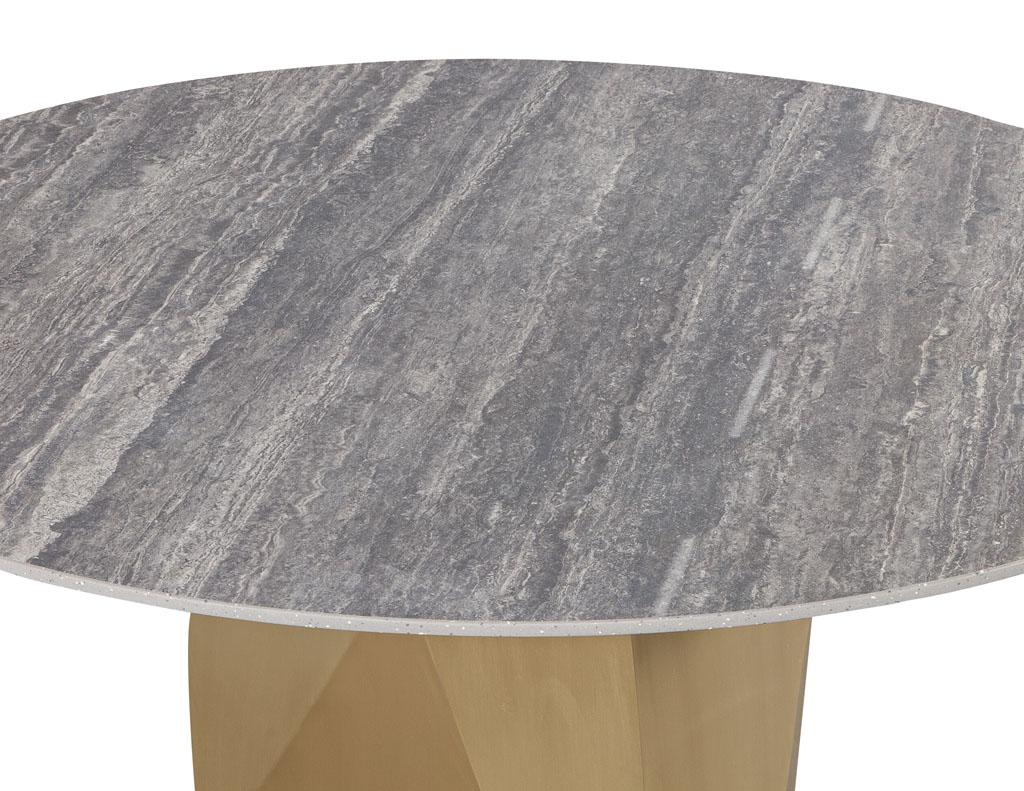 https://a.1stdibscdn.com/custom-modern-round-porcelain-dining-table-with-geometric-brass-base-for-sale-picture-5/f_8849/f_288134121653495405257/DS_5188_Carrocel_Custom_Stone_Top_Round_Modern_Dining_Table_005_master.jpg