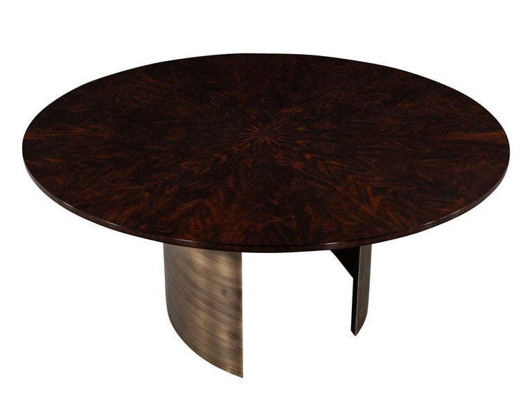 https://a.1stdibscdn.com/custom-round-sunburst-mahogany-dining-table-by-carrocel-for-sale-picture-2/f_8849/f_289082821654033089935/DS_5191_Custom_Round_Sunburst_Mahogany_Dining_Table_by_Carrocel_002_master.jpg?width=768