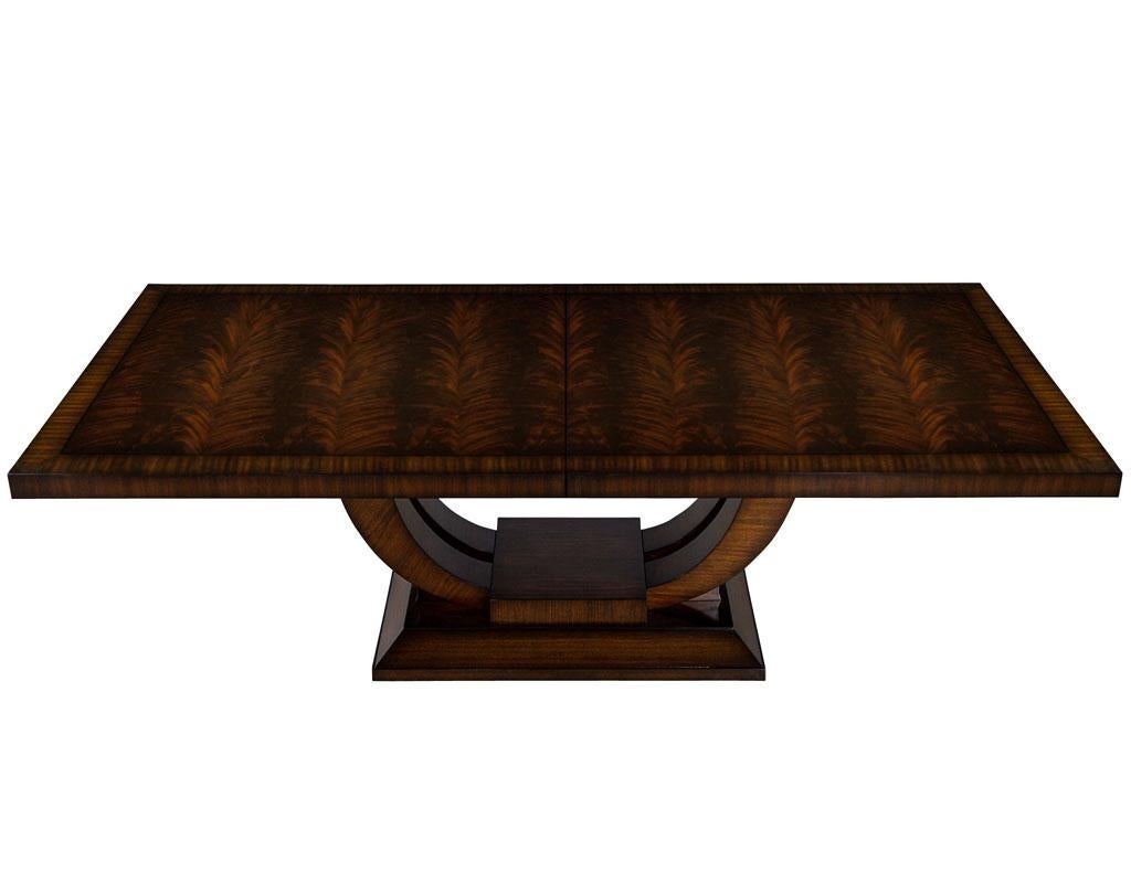 https://a.1stdibscdn.com/custom-art-deco-inspired-mahogany-dining-table-with-rosewood-banding-design-for-sale-picture-3/f_8849/f_297319121658769051681/DS_5195_Custom_Art_Deco_Inspired_Dining_Table_003_master.jpg