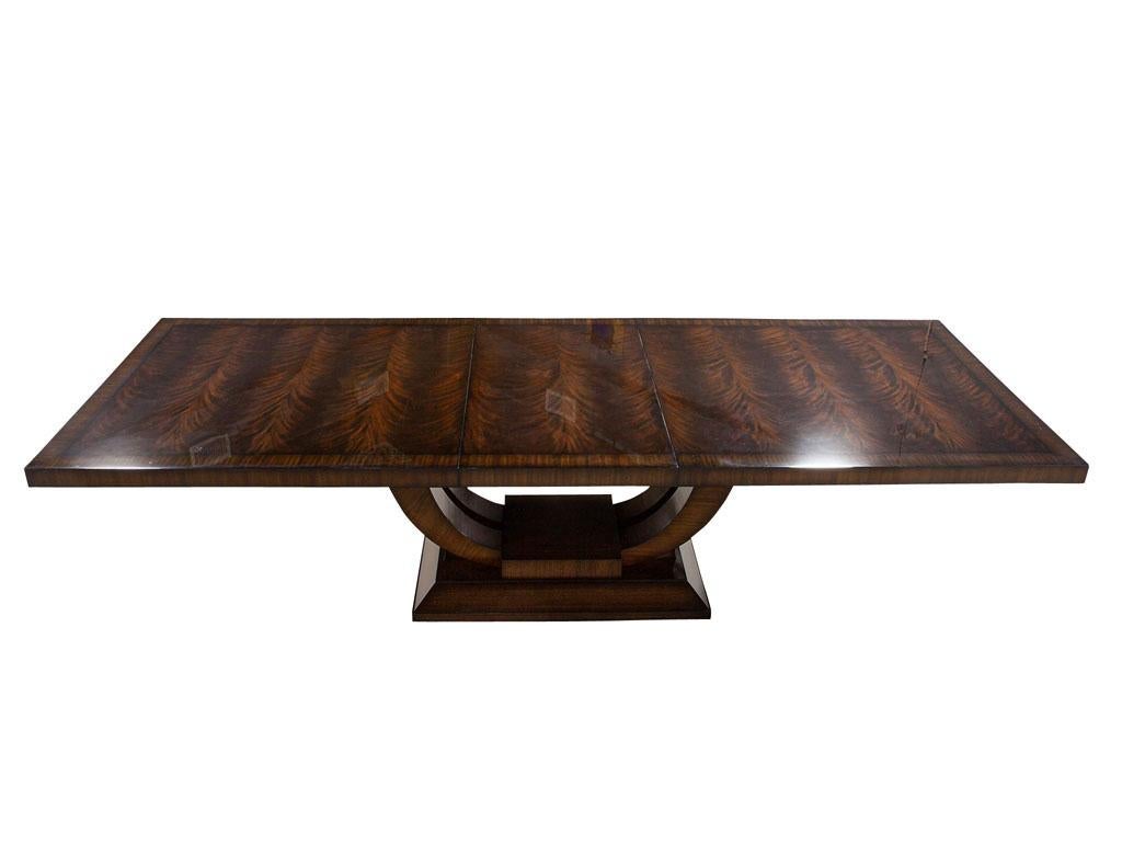 https://a.1stdibscdn.com/custom-art-deco-inspired-mahogany-dining-table-with-rosewood-banding-design-for-sale-picture-4/f_8849/f_297319121658769051717/DS_5195_Custom_Art_Deco_Inspired_Dining_Table_004_master.jpg