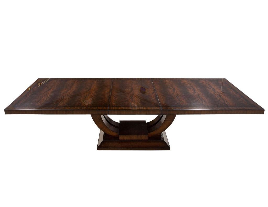 https://a.1stdibscdn.com/custom-art-deco-inspired-mahogany-dining-table-with-rosewood-banding-design-for-sale-picture-5/f_8849/f_297319121658769051679/DS_5195_Custom_Art_Deco_Inspired_Dining_Table_005_master.jpg