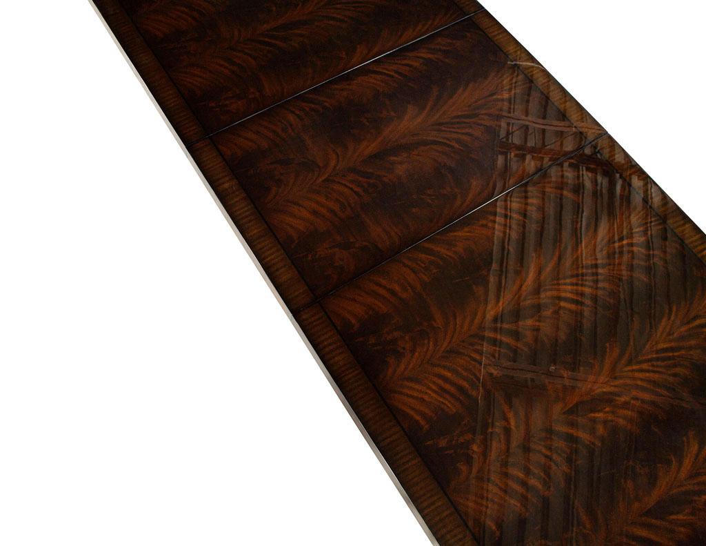 https://a.1stdibscdn.com/custom-art-deco-inspired-mahogany-dining-table-with-rosewood-banding-design-for-sale-picture-9/f_8849/f_297319121658769051747/DS_5195_Custom_Art_Deco_Inspired_Dining_Table_009_master.jpg