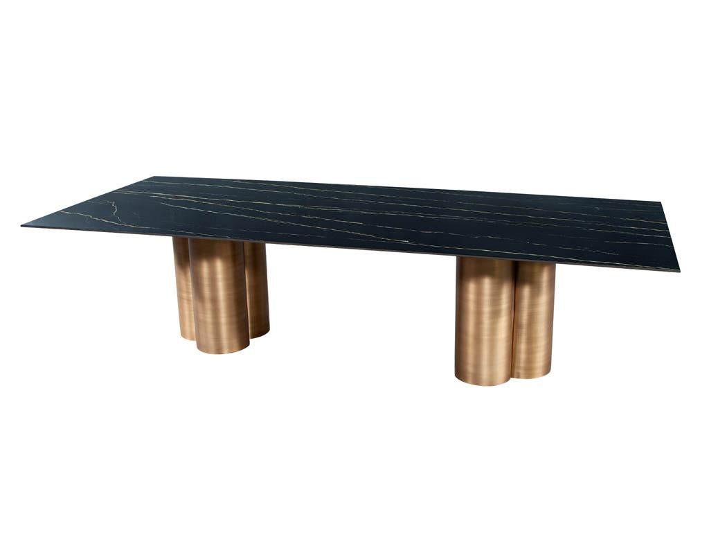 https://a.1stdibscdn.com/custom-modern-porcelain-dining-table-with-antiqued-brass-clover-pedestals-for-sale-picture-2/f_8849/f_312581421668120783375/DS_5211_Modern_Porcelain_Dining_Table_Antiqued_Brass_Clover_Pedestals_002_master.jpg