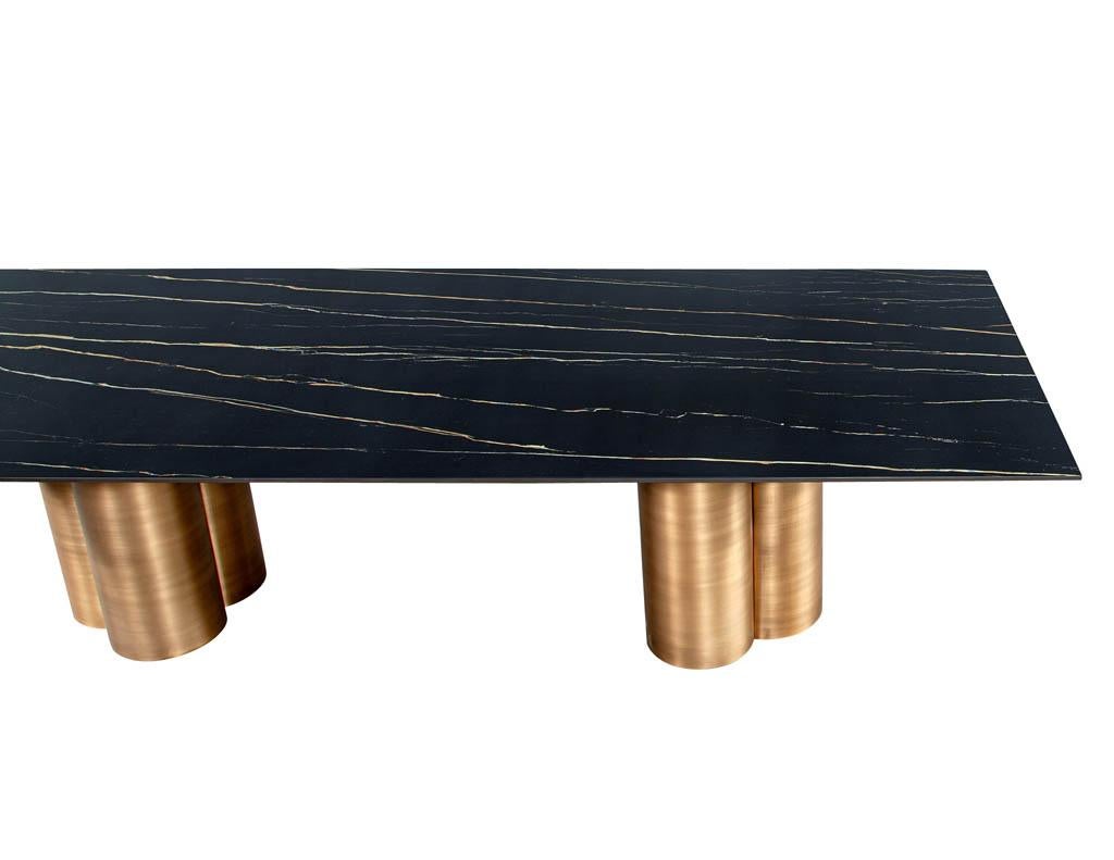 https://a.1stdibscdn.com/custom-modern-porcelain-dining-table-with-antiqued-brass-clover-pedestals-for-sale-picture-3/f_8849/f_312581421668120783321/DS_5211_Modern_Porcelain_Dining_Table_Antiqued_Brass_Clover_Pedestals_003_master.jpg