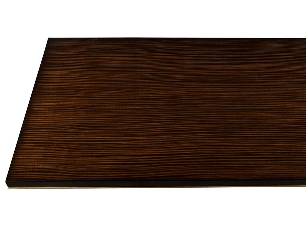 https://a.1stdibscdn.com/custom-walnut-dining-table-with-brass-details-for-sale-picture-8/f_8849/f_329189121677092745900/DS_5215_Carrocel_Custom_Walnut_Dining_Table_Brass_Details_0011_master.jpg